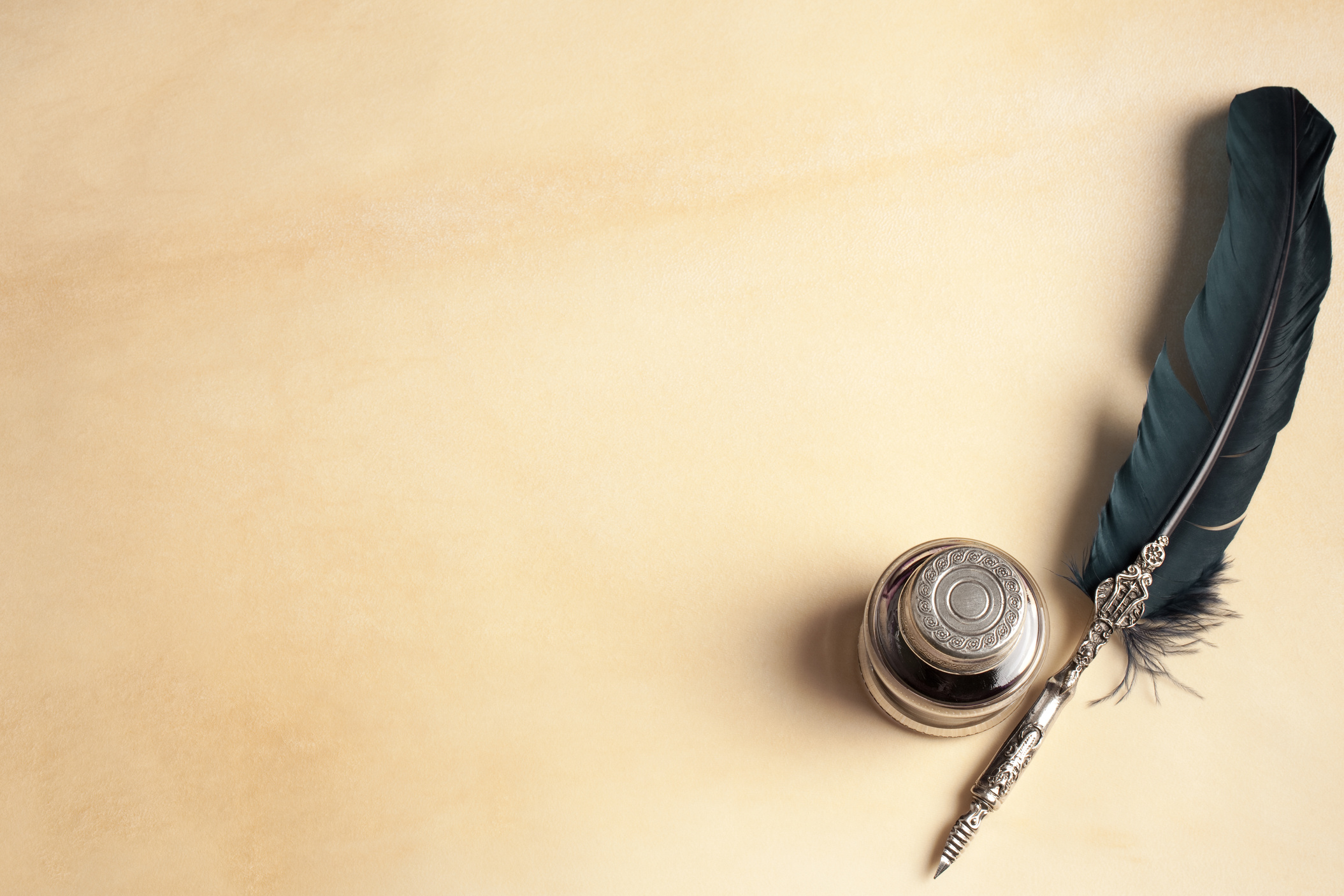 Quill pen on parchment